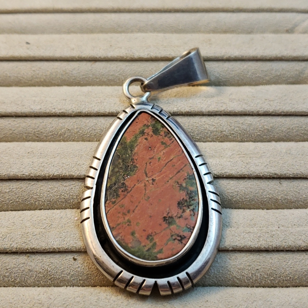 Charles Albert sterling silver pendant.